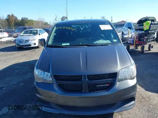 2016 Dodge Grand Caravan SE with VIN 2C4RDGBG8GR335456, listed as a IAAI auction lot 41537809 with 125,081 mi miles and . Bid and sale history available at DreamBid. Image 12.
