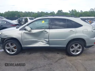 2006 Lexus RX 400h with VIN JTJHW31U462004373, listed as a IAAI auction lot 42081583 with 294,827 mi miles and . Bid and sale history available at DreamBid. Image 15.