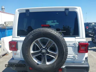 2019 Jeep Wrangler Unlimited Sahara with VIN 1C4HJXENXKW684942, listed as a IAAI auction lot 42021869 with 55,137 mi miles and . Bid and sale history available at DreamBid. Image 16.