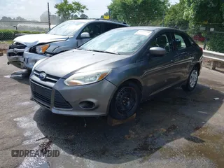 2012 Ford Focus SE z VIN 1FAHP3F22CL125941, wystawiony jako IAAI lot #42176898 z przebiegiem 157 940 mil mil oraz . Historia ofert i sprzedaży dostępna na DreamBid. Obrazek 6.