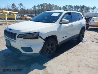 2019 Jeep Cherokee Latitude Plus with VIN 1C4PJLLB2KD296144, listed as a IAAI auction lot 41681051 with 199,698 mi miles. Bid and sale history available at carsss.com. Image 17.