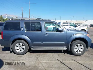 2005 Nissan Pathfinder SE with VIN 5N1AR18U05C741080, listed as a IAAI auction lot 40671277 with 215,693 mi miles. Bid and sale history available at carsss.com. Image 13.