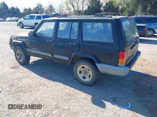 2001 Jeep Cherokee Sport with VIN 1J4FT48SX1L581192, listed as a IAAI auction lot 41828841 with 315,822 mi miles. Bid and sale history available at carsss.com. Image 3.