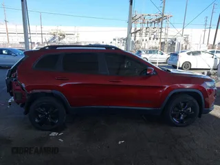 2021 Jeep Cherokee Altitude with VIN 1C4PJLLB0MD120227, listed as a IAAI auction lot 41350113 with 71,644 mi miles. Bid and sale history available at carsss.com. Image 14.
