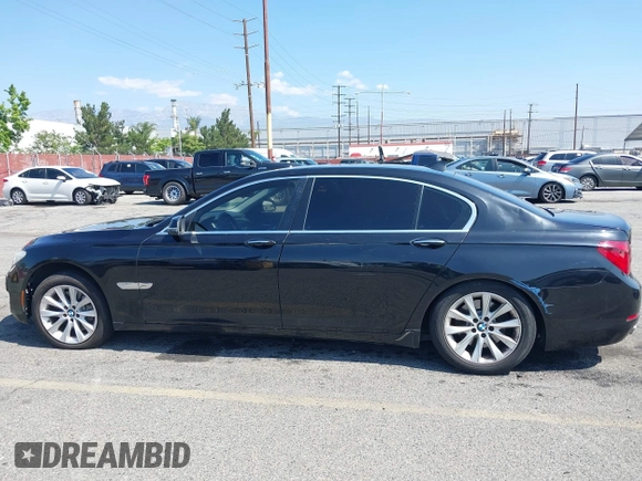 2015 BMW 7 Series 740Li with VIN WBAYE4C57FD138961, listed as a IAAI auction lot 42216122 with 224,740 mi miles and . Bid and sale history available at DreamBid. Image 13.