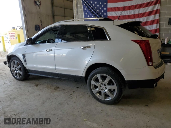 2011 Cadillac SRX Performance Collection with VIN 3GYFNBEY2BS580640, listed as a Copart auction lot 52812555 with 80,547 mi miles and Salvage Title. Bid and sale history available at carsss.com. Image 2.