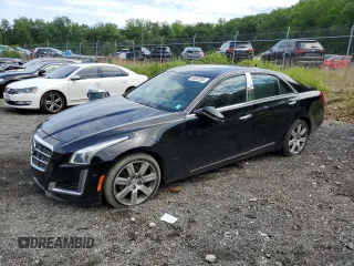 2014 Cadillac CTS Premium AWD с VIN 1G6AZ5S38E0158711, выставлен на аукционе Copart как лот 58987365 с пробегом 85 492 миль миль и Списание • Salvage title. История ставок и продаж доступна на DreamBid. Изображение 1.