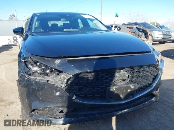 2022 Mazda 3 Carbon Edition z VIN JM1BPACLXN1507604, wystawiony jako IAAI lot #41408768 z przebiegiem 77 239 mil mil oraz . Historia ofert i sprzedaży dostępna na DreamBid. Obrazek 12.