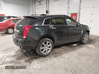 2011 Cadillac SRX Performance Collection with VIN 3GYFNEEY9BS533994, listed as a IAAI auction lot 40990072 with 168,134 mi miles. Bid and sale history available at carsss.com. Image 4.