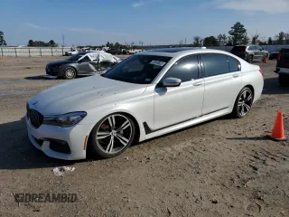 2016 BMW 7 Series 740i with VIN WBA7E2C58GG548314, listed as a Copart auction lot 72876922 with 74,981 mi miles. Bid and sale history available at carsss.com. Image 1.