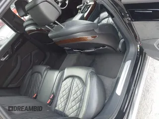 2015 Audi A8 L 4.0T with VIN WAU32AFD7FN006233, listed as a IAAI auction lot 41353034 with 119,693 mi miles. Bid and sale history available at carsss.com. Image 8.