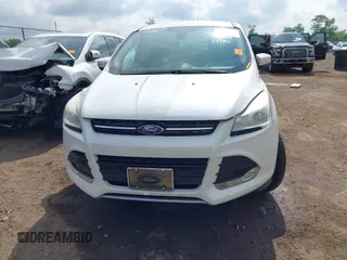 2013 Ford Escape SEL with VIN 1FMCU9HX6DUB14053, listed as a IAAI auction lot 42361297 with 144,861 mi miles and . Bid and sale history available at DreamBid. Image 12.