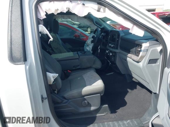 2023 Ford F-150 XL with VIN 1FTMF1C53PKF34184, listed as a IAAI auction lot 42242703 with 27,312 mi miles and . Bid and sale history available at DreamBid. Image 5.