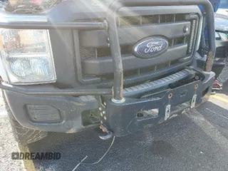 2015 Ford Super Duty F-250 SRW XLT with VIN 1FT7X2B64FEA59832, listed as a IAAI auction lot 42024162 with 200,142 mi miles. Bid and sale history available at carsss.com. Image 1.