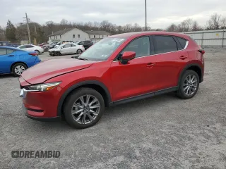 2021 Mazda CX-5 Grand Touring Reserve with VIN JM3KFBAY3M0315640, listed as a Copart auction lot 51004955 with 21,981 mi miles and Salvage Title. Bid and sale history available at carsss.com. Image 1.