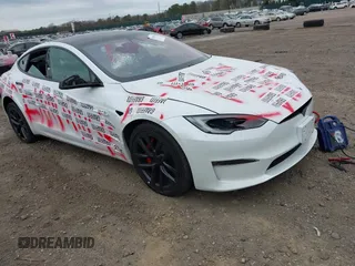 2023 Tesla Model S Plaid with VIN 5YJSA1E68PF507197, listed as a IAAI auction lot 42062258 with Not provided miles and . Bid and sale history available at DreamBid. Image 1.