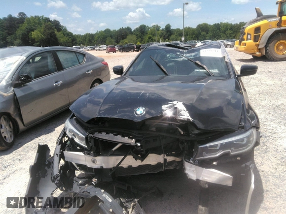 2021 BMW 3 Series 330i z VIN 3MW5R1J0XM8B73341, wystawiony jako IAAI lot #41462711 z przebiegiem Nie podano mil oraz . Historia ofert i sprzedaży dostępna na DreamBid. Obrazek 11.