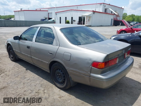 2001 Toyota Camry CE with VIN 4T1BG22KX1U072957, listed as a IAAI auction lot 42167686 with 200,126 mi miles. Bid and sale history available at carsss.com. Image 3.