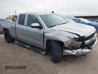 2018 Chevrolet Silverado 1500 LT with VIN 1GCVKREH8JZ267659, listed as a IAAI auction lot 41279618 with 143,310 mi miles and . Bid and sale history available at DreamBid. Image 1.