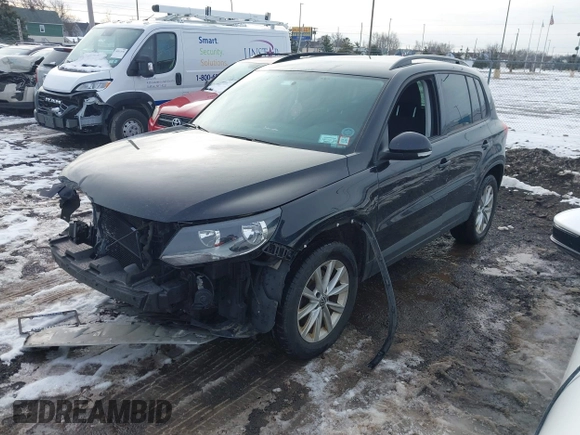 2017 Volkswagen Tiguan S with VIN WVGBV7AX7HK047973, listed as a IAAI auction lot 41197329 with 92,960 mi miles and . Bid and sale history available at DreamBid. Image 17.