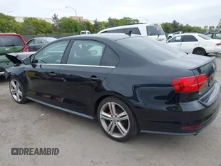 2017 Volkswagen Jetta GLI z VIN 3VW4T7AJ1HM347867, wystawiony jako IAAI lot #42408757 z przebiegiem 82 905 mil mil oraz . Historia ofert i sprzedaży dostępna na DreamBid. Obrazek 3.