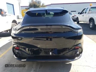 2022 Aston Martin DBX z VIN SD7VUJAW1NTV05151, wystawiony jako Copart lot #70043184 z przebiegiem 14 345 mil mil oraz Szkody całkowita. Historia ofert i sprzedaży dostępna na DreamBid. Obrazek 6.