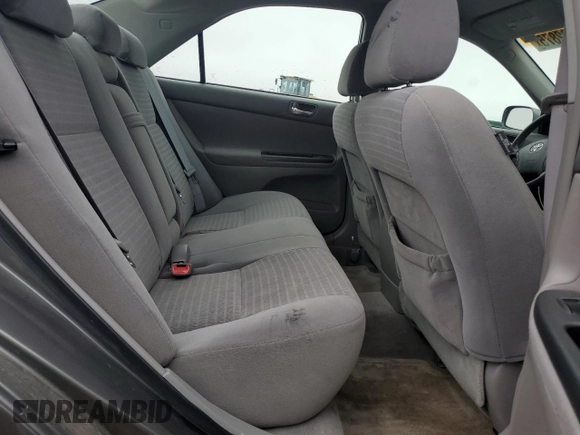 2005 Toyota Camry LE z VIN 4T1BE30K05U579984, wystawiony jako Copart lot #58482875 z przebiegiem 74 638 mil mil oraz Szkoda całkowita • Salvage title. Historia ofert i sprzedaży dostępna na DreamBid. Obrazek 10.