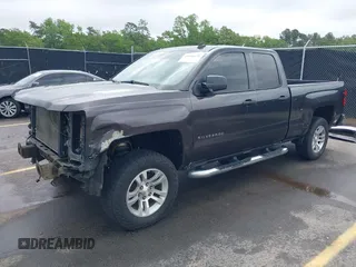 2014 Chevrolet Silverado 1500 LT with VIN 1GCRCREC5EZ161985, listed as a IAAI auction lot 42096479 with 225,412 mi miles and . Bid and sale history available at DreamBid. Image 2.