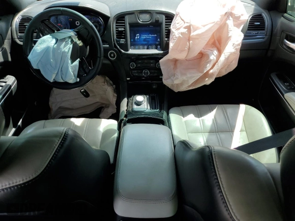 2017 Chrysler 300 S with VIN 2C3CCABG4HH596990, listed as a Copart auction lot 70430024 with 102,679 mi miles and Salvage Title. Bid and sale history available at DreamBid. Image 8.