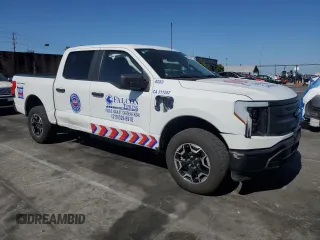 2023 Ford F-150 Lightning Pro с VIN 1FTVW1EL2PWG13712, выставлен на аукционе Copart как лот 56950955 с пробегом 60 605 миль миль и Списание • Salvage title. История ставок и продаж доступна на DreamBid. Изображение 4.