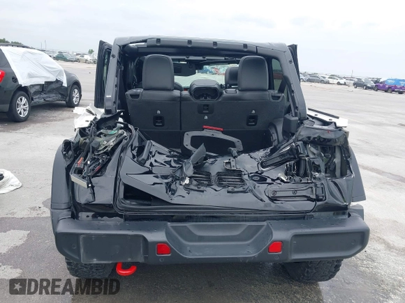 2021 Jeep Wrangler Unlimited Rubicon with VIN 1C4HJXFG7MW662092, listed as a IAAI auction lot 42139521 with 32,055 mi miles and . Bid and sale history available at DreamBid. Image 16.