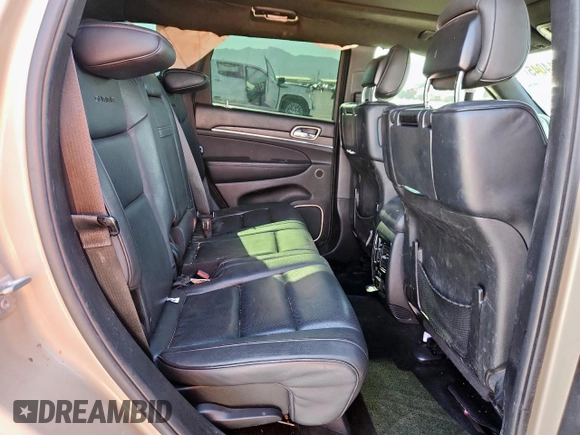 2015 Jeep Grand Cherokee Summit with VIN 1C4RJEJG9FC952192, listed as a Copart auction lot 63714045 with 147,732 mi miles and Salvage title. Bid and sale history available at DreamBid. Image 10.
