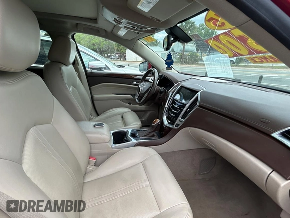 2015 Cadillac SRX Luxury Collection z VIN 3GYFNBE37FS569840, wystawiony jako Copart lot #52823025 z przebiegiem 183 816 mil mil oraz Czysty tytuł • Clean title. Historia ofert i sprzedaży dostępna na DreamBid. Obrazek 5.
