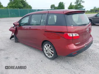 2012 Mazda 5 Grand Touring with VIN JM1CW2DL8C0142483, listed as a IAAI auction lot 42258349 with 144,547 mi miles and . Bid and sale history available at DreamBid. Image 3.