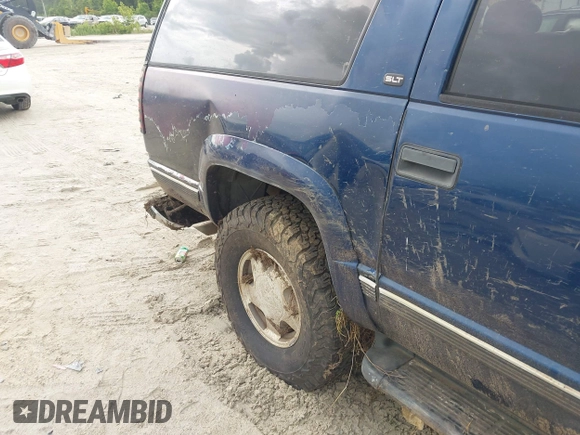 1999 GMC Suburban with VIN 3GKFK16R2XG501319, listed as a IAAI auction lot 42491117 with 231,561 mi miles and . Bid and sale history available at DreamBid. Image 12.