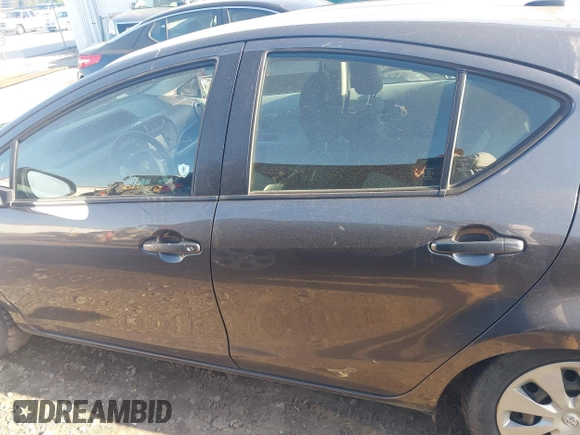 2014 Toyota Prius One with VIN JTDKDTB32E1564580, listed as a IAAI auction lot 41972541 with 186,673 mi miles and . Bid and sale history available at DreamBid. Image 14.