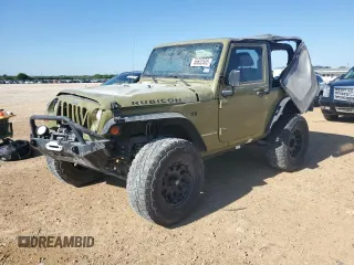2013 Jeep Wrangler Rubicon with VIN 1C4HJWCG1DL574039, listed as a Copart auction lot 56603505 with 116,537 mi miles and Salvage title. Bid and sale history available at DreamBid. Image 1.