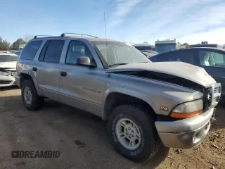 2000 Dodge Durango with VIN 1B4HS28Z6YF255687, listed as a Copart auction lot 84959164 with 189,369 mi miles and Salvage Title. Bid and sale history available at DreamBid. Image 4.