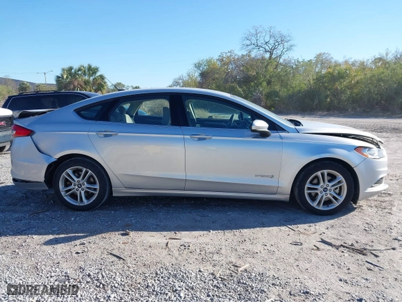 2018 Ford Fusion Hybrid S with VIN 3FA6P0UU8JR244912, listed as a IAAI auction lot 41742940 with 65,885 mi miles. Bid and sale history available at carsss.com. Image 13.