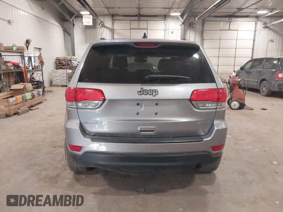 2015 Jeep Grand Cherokee Laredo with VIN 1C4RJFAG4FC797069, listed as a IAAI auction lot 41435299 with 146,755 mi miles. Bid and sale history available at carsss.com. Image 16.