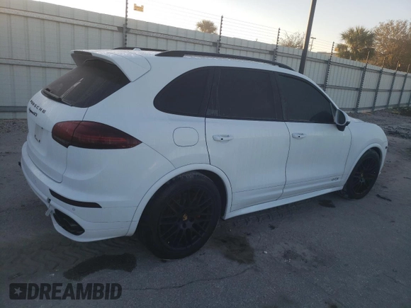 2017 Porsche Cayenne GTS with VIN WP1AD2A29HLA83277, listed as a Copart auction lot 76765974 with 47,838 mi miles and Salvage title. Bid and sale history available at DreamBid. Image 3.