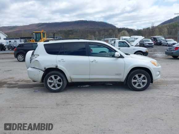 2010 Toyota RAV4 Limited with VIN JTMDF4DV3A5023063, listed as a IAAI auction lot 41983738 with 163,059 mi miles and . Bid and sale history available at DreamBid. Image 14.