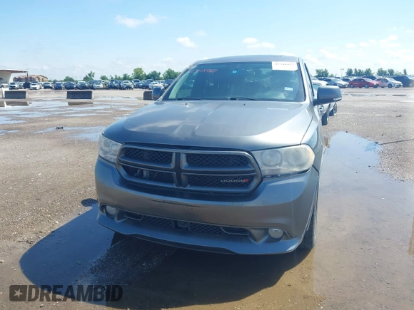 2013 Dodge Durango R/T z VIN 1C4SDHCT7DC564802, wystawiony jako IAAI lot #42348957 z przebiegiem 178 354 mil mil oraz . Historia ofert i sprzedaży dostępna na DreamBid. Obrazek 6.