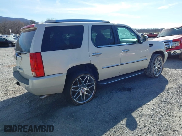 2009 Cadillac Escalade z VIN 1GYFK53219R121847, wystawiony jako IAAI lot #41818934 z przebiegiem 132 293 mil mil oraz . Historia ofert i sprzedaży dostępna na DreamBid. Obrazek 4.