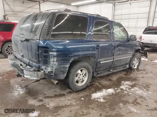 2001 Chevrolet Tahoe LS with VIN 1GNEK13TX1R108982, listed as a IAAI auction lot 41622297 with 202,013 mi miles. Bid and sale history available at carsss.com. Image 4.