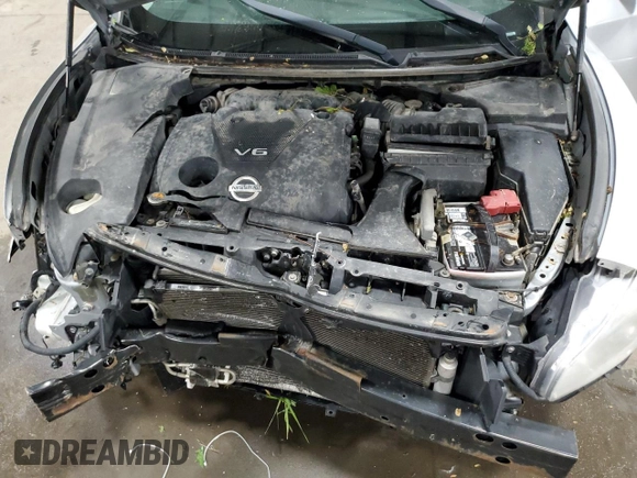 2012 Nissan Maxima S с VIN 1N4AA5AP4CC810914, выставлен на аукционе Copart как лот 57986525 с пробегом 135 435 миль миль и Списание • Salvage title. История ставок и продаж доступна на DreamBid. Изображение 11.
