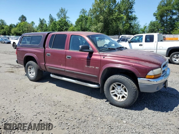 2001 Dodge Dakota z VIN 1B7GG2AZ41S152288, wystawiony jako Copart lot #59952635 z przebiegiem 167 721 mil mil oraz Czysty tytuł • Clean title. Historia ofert i sprzedaży dostępna na DreamBid. Obrazek 4.