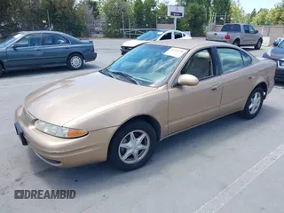 1999 Oldsmobile Alero GL z VIN 1G3NL52T1XC384073, wystawiony jako IAAI lot #42359330 z przebiegiem 177 869 mil mil oraz . Historia ofert i sprzedaży dostępna na DreamBid. Obrazek 17.