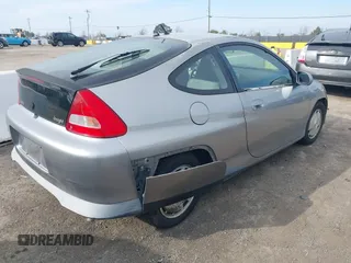 2001 Honda Insight z VIN JHMZE14741T003228, wystawiony jako IAAI lot #41432511 z przebiegiem 227 809 mil mil oraz . Historia ofert i sprzedaży dostępna na DreamBid. Obrazek 4.