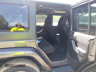 2016 Jeep Wrangler Unlimited Sahara with VIN 1C4BJWEG7GL340074, listed as a IAAI auction lot 42434763 with 81,095 mi miles and . Bid and sale history available at DreamBid. Image 8.